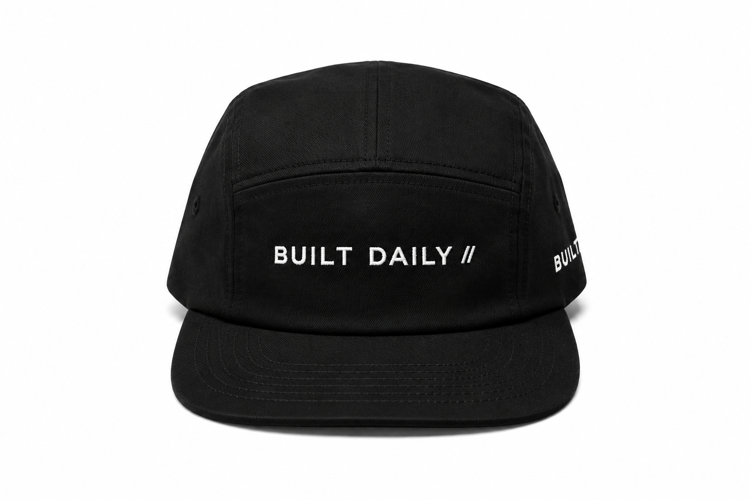 Built Daily black cap flat lay.